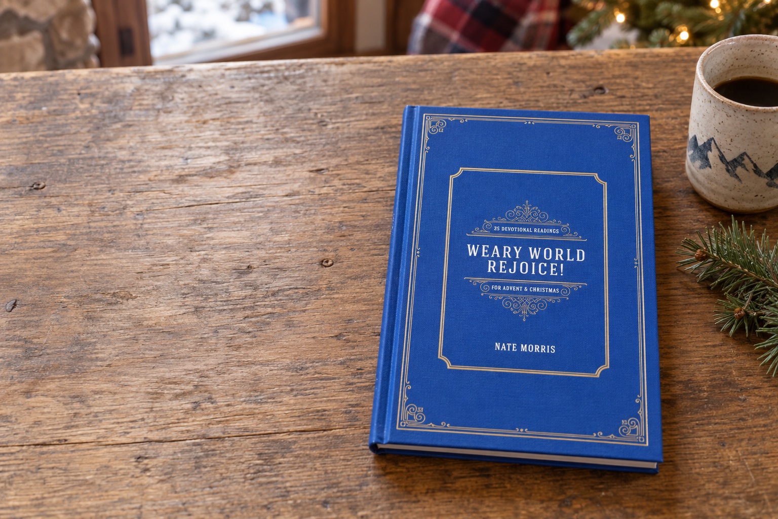 Weary World Rejoice! by Nate Morris, staged on a wooden table with coffee and Christmas greenery.