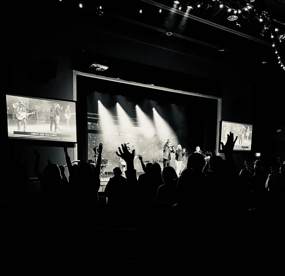 People worshiping during a Mountain Life Church gathering